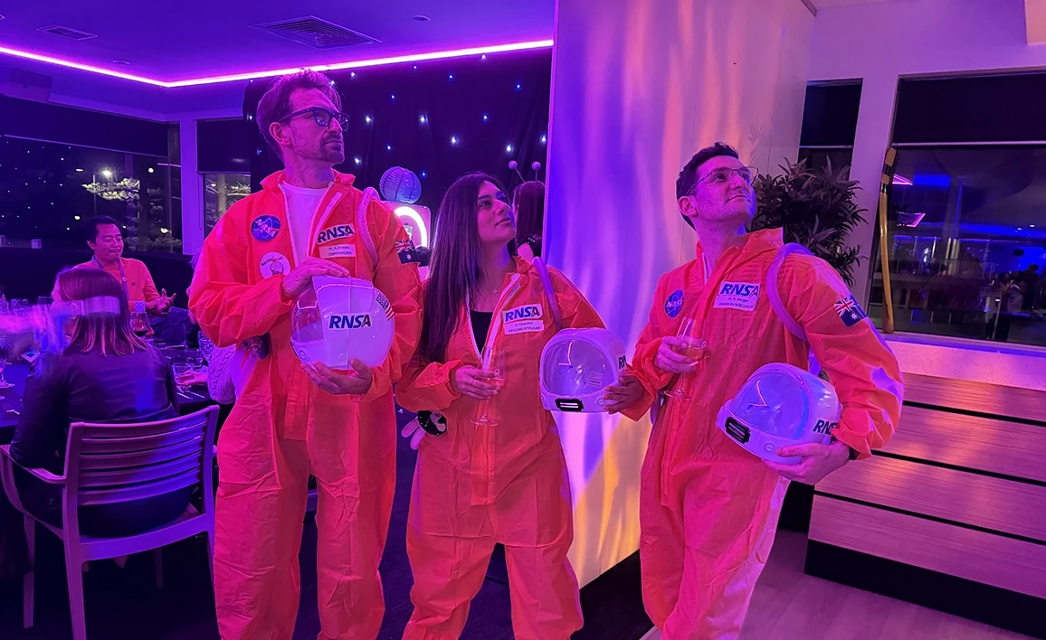 Delegates enjoying the space-themed conference dinner