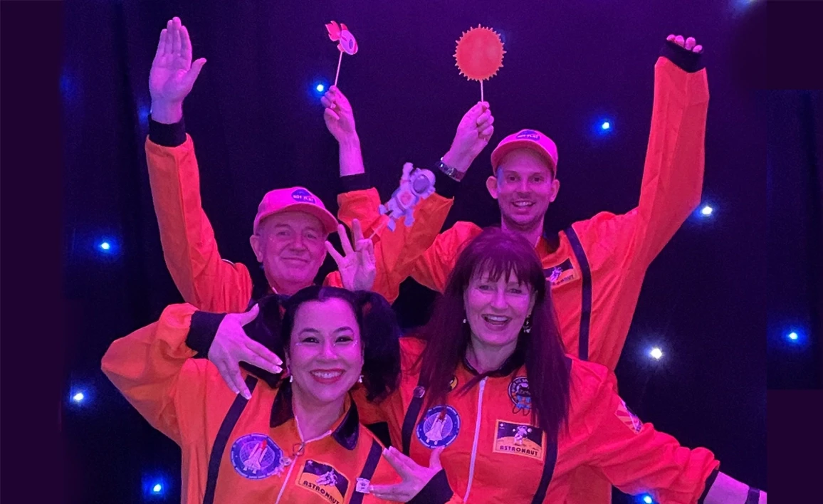 Delegates enjoying the space-themed conference dinner