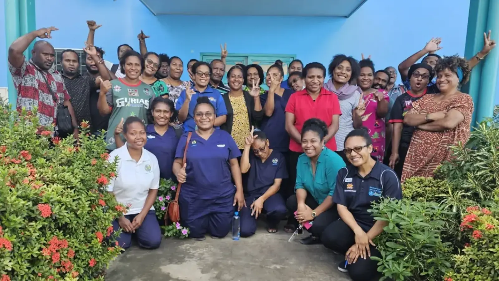 Group of medical professionals in Papua New Guinea smiling at camera