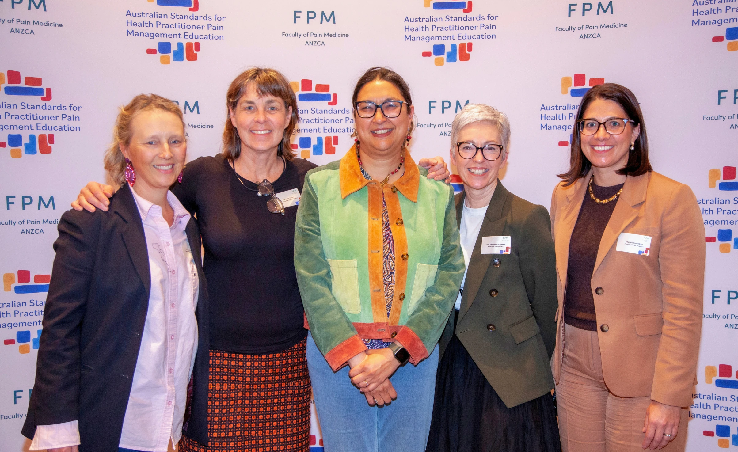2026 FPM Pain Education Summit delegates in front of the FPM media wall