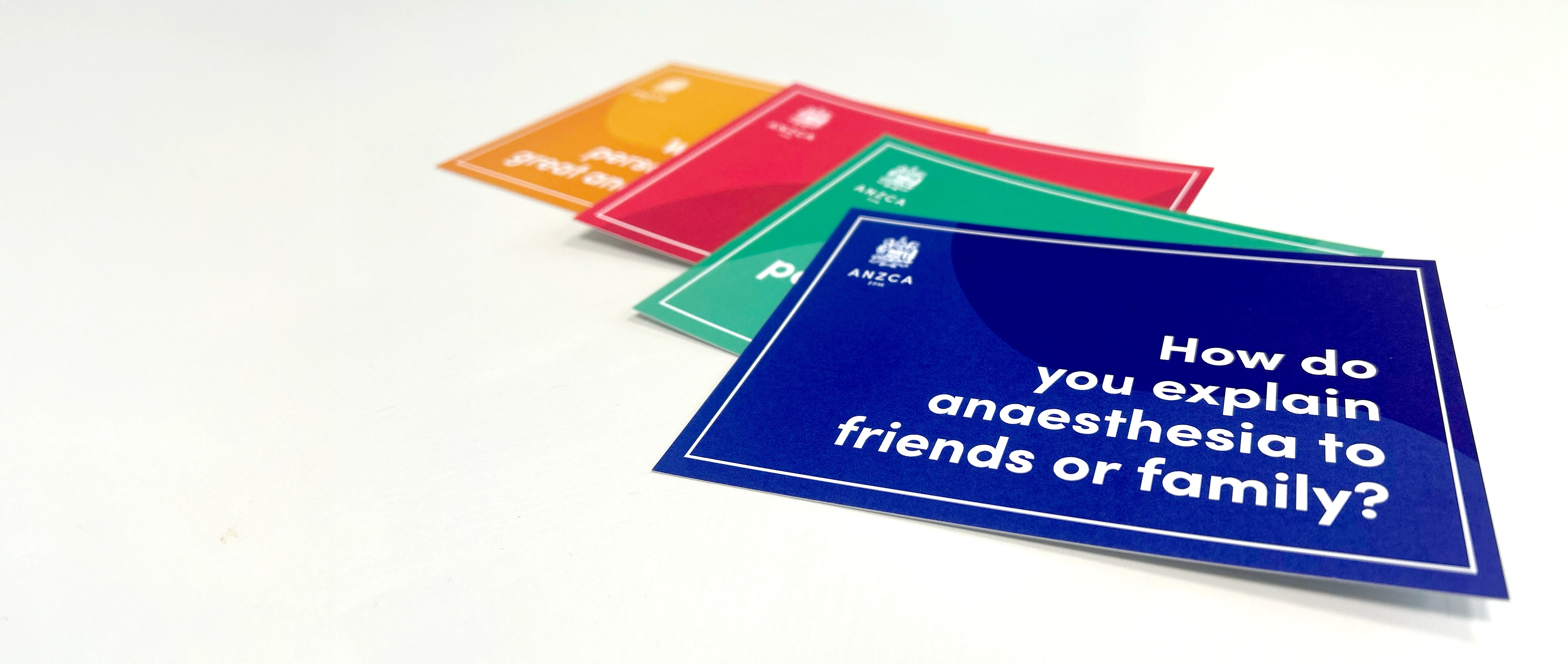 Four coloured postcards