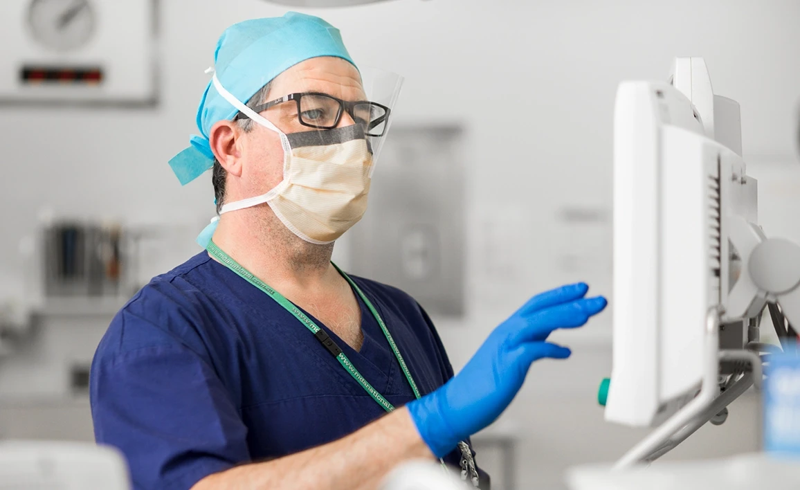 Anaesthetist looking at monitor