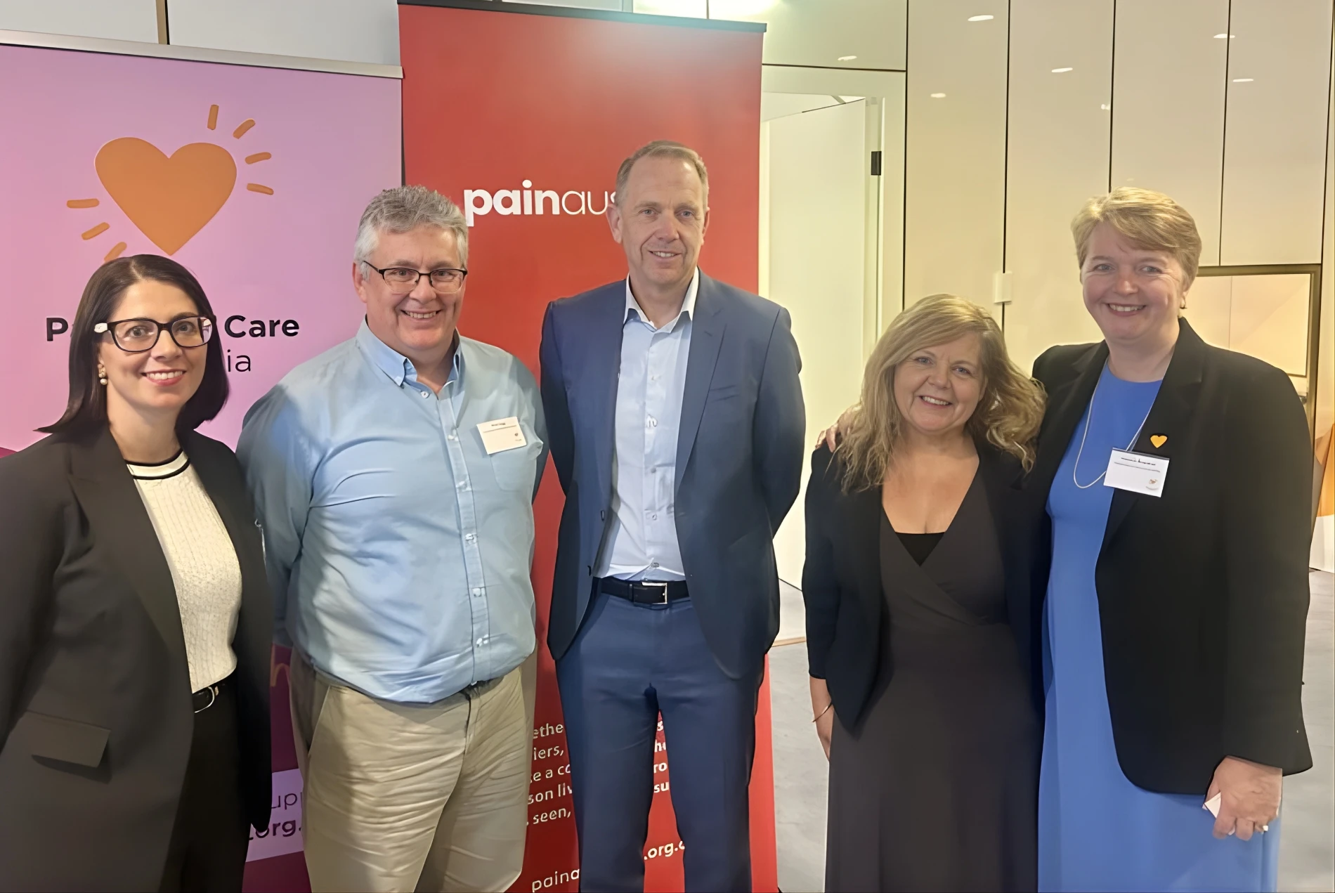 Five people standing