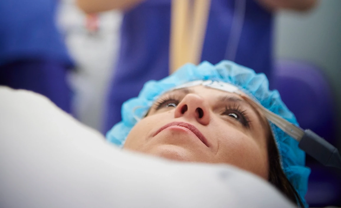 Female patient lying on operating table